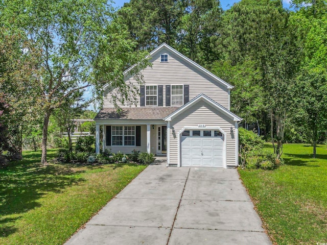 traditional-style home with a garage, a front lawn, and driveway