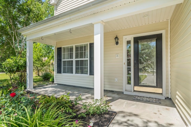 property entrance with a porch
