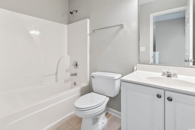 full bath with vanity, toilet, baseboards, washtub / shower combination, and tile patterned floors