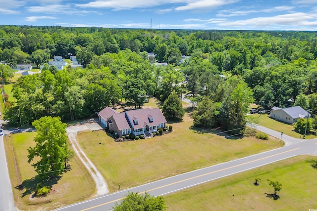 aerial view featuring a view of trees