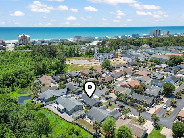 birds eye view of property with a residential view and a water view