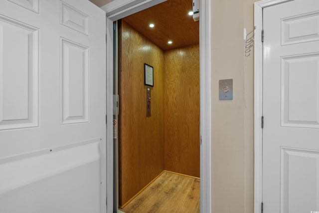 215-B S Dogwood Dr, Surfside Beach, SC 29575 - hall featuring recessed lighting, light wood-type flooring, and elevator