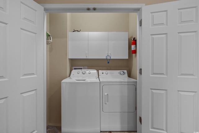215-B S Dogwood Dr, Surfside Beach, SC 29575 - clothes washing area featuring cabinet space and washer and clothes dryer