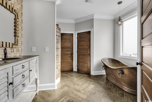 130 Hagar Brown Rd, Murrells Inlet, SC 29576 - bathroom with vanity, ornamental molding, decorative backsplash, baseboards, and a freestanding bath