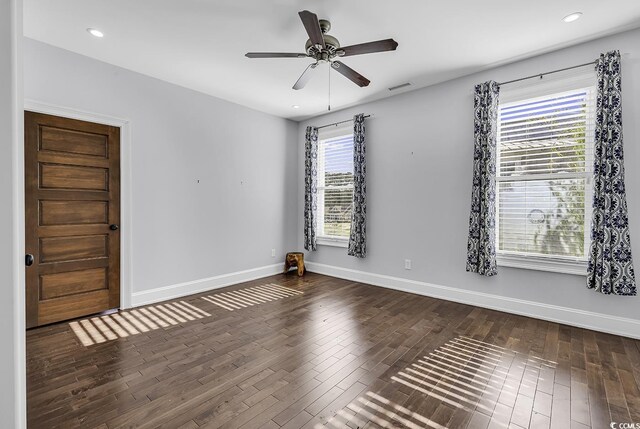 130 Hagar Brown Rd, Murrells Inlet, SC 29576 - spare room featuring baseboards, ceiling fan, wood finished floors, and visible vents