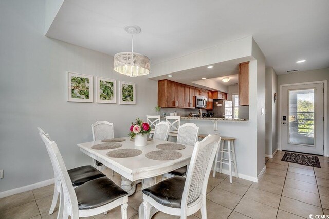 201 N Hillside Dr Unit 311-A, North Myrtle Beach, SC 29582 - dining area with visible vents, baseboards, recessed lighting, a chandelier, and light tile patterned floors