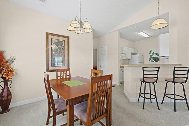 217 Wando River Rd Unit 12-H, Myrtle Beach, SC 29579 - dining space with light colored carpet, baseboards, a chandelier, and vaulted ceiling