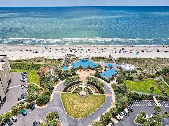 bird's eye view featuring a beach view and a water view