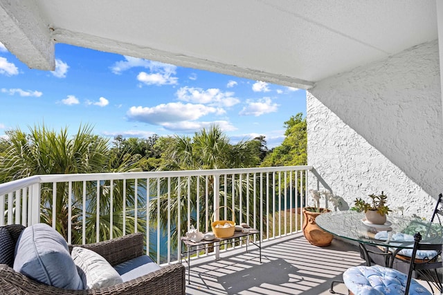 balcony featuring a sunroom