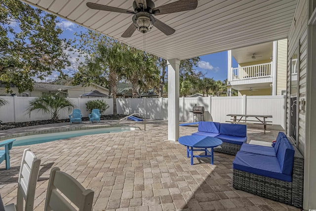 view of patio with an outdoor living space, a ceiling fan, a fenced in pool, a fenced backyard, and a grill