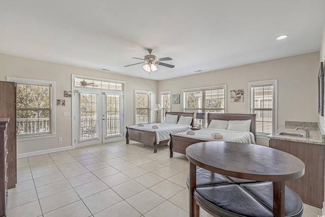 living area with french doors, a ceiling fan, baseboards, recessed lighting, and light tile patterned flooring