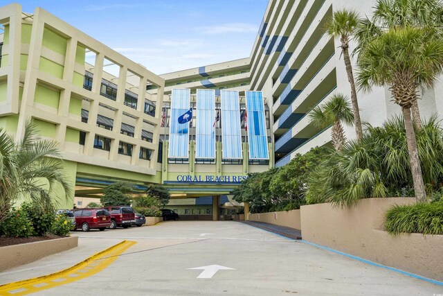 1105 S Ocean Blvd Unit 1024, Myrtle Beach, SC 29572 - view of property featuring uncovered parking