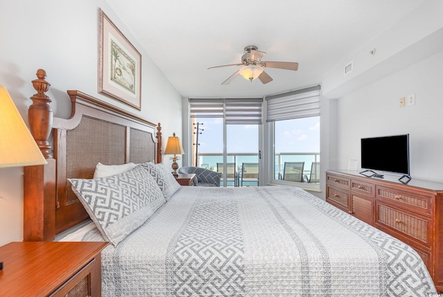 bedroom with access to outside, a ceiling fan, and visible vents