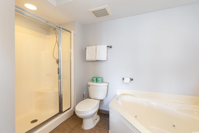 bathroom with a jetted tub, visible vents, tile patterned flooring, a stall shower, and toilet