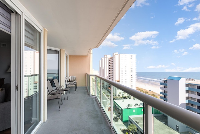 balcony featuring a water view