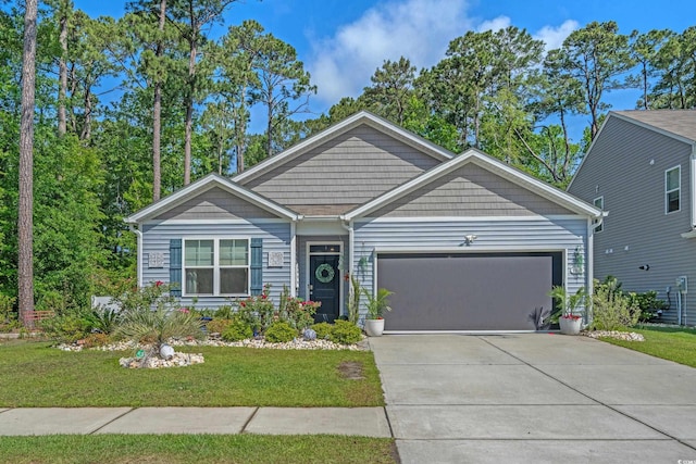1011 Maxwell Dr, Little River, SC 29566 - view of front of property featuring concrete driveway, a front yard, and a garage