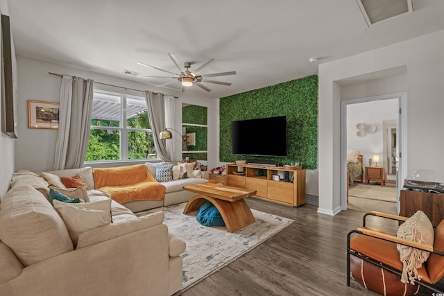 1011 Maxwell Dr, Little River, SC 29566 - living area featuring a ceiling fan, visible vents, and dark wood-type flooring