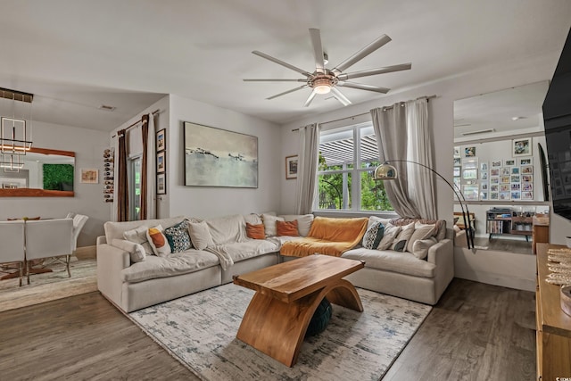 1011 Maxwell Dr, Little River, SC 29566 - living area featuring a ceiling fan and dark wood-style flooring