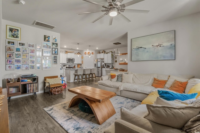 1011 Maxwell Dr, Little River, SC 29566 - living room featuring visible vents, ceiling fan, and dark wood-style floors