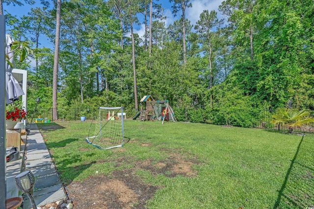1011 Maxwell Dr, Little River, SC 29566 - view of yard with fence and a playground