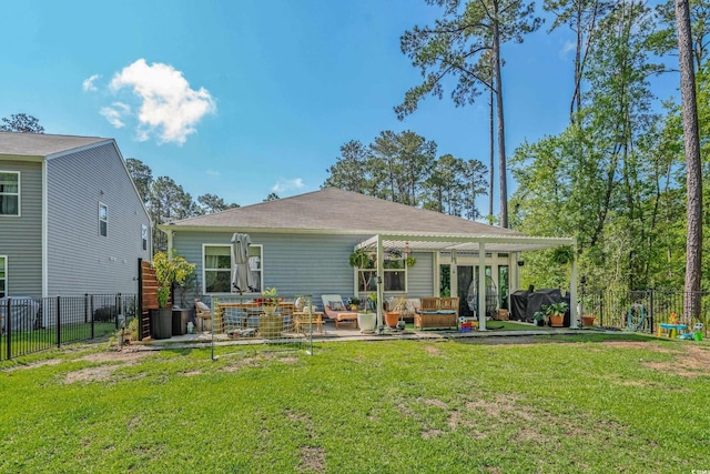1011 Maxwell Dr, Little River, SC 29566 - back of property featuring a lawn, a pergola, an outdoor living space, and a fenced backyard