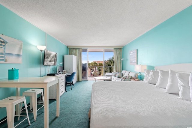 6803 N Ocean Blvd Unit 328, Myrtle Beach, SC 29572 - bedroom featuring carpet floors, access to outside, a desk, floor to ceiling windows, and a textured ceiling