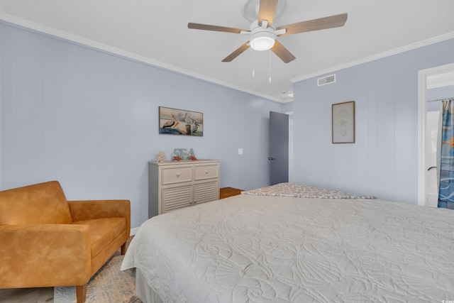bedroom with ceiling fan, visible vents, and ornamental molding