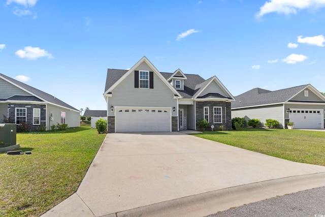 craftsman-style house featuring an attached garage, a front yard, stone siding, and concrete driveway