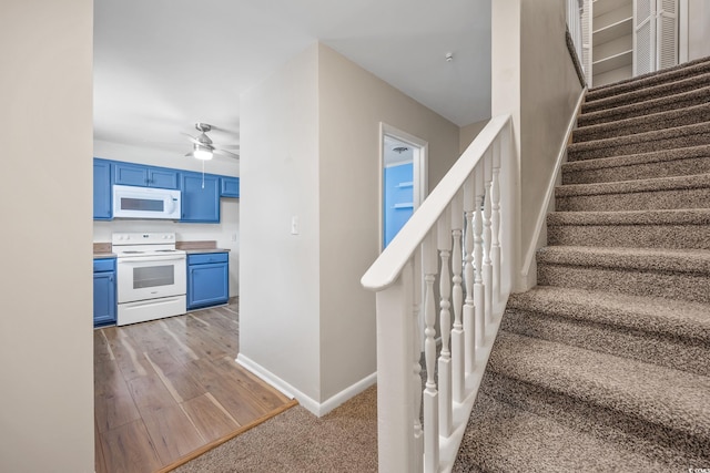 2701 Hillside Dr S Unit 1, North Myrtle Beach, SC 29582 - stairs with baseboards, a ceiling fan, wood finished floors, and carpet flooring