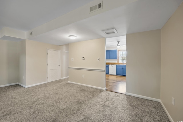 2701 Hillside Dr S Unit 1, North Myrtle Beach, SC 29582 - spare room with carpet flooring, attic access, baseboards, and a sink