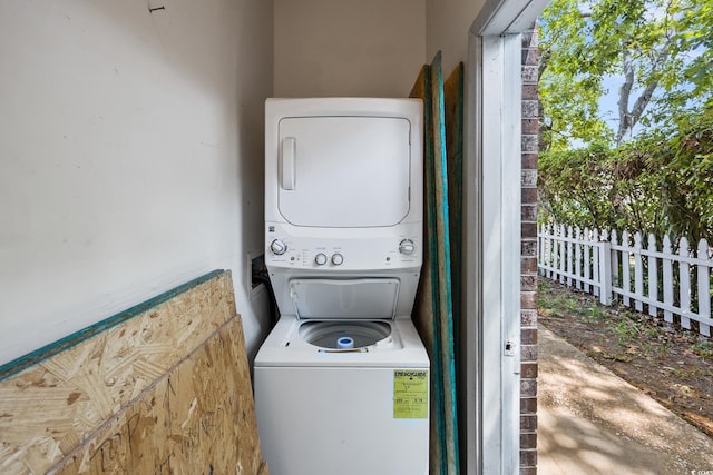 2701 Hillside Dr S Unit 1, North Myrtle Beach, SC 29582 - laundry area featuring stacked washer and clothes dryer
