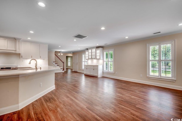 107 Azalea Dr, Conway, SC 29526 - kitchen featuring visible vents, baseboards, crown molding, and white cabinets