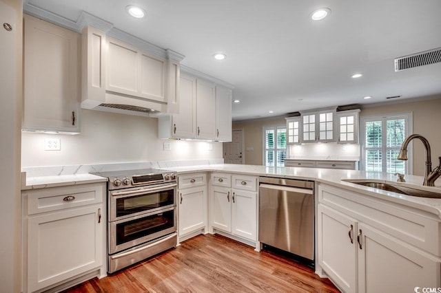 107 Azalea Dr, Conway, SC 29526 - kitchen with a sink, white cabinets, stainless steel appliances, and visible vents