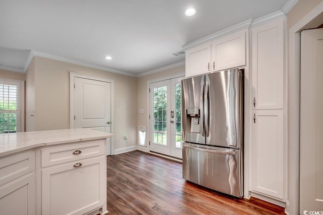 107 Azalea Dr, Conway, SC 29526 - kitchen with white cabinets, ornamental molding, stainless steel refrigerator with ice dispenser, and wood finished floors
