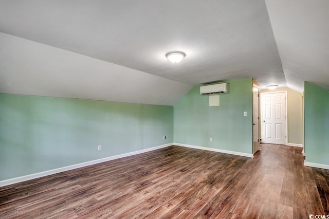 107 Azalea Dr, Conway, SC 29526 - bonus room featuring baseboards, dark wood finished floors, lofted ceiling, and a wall unit AC