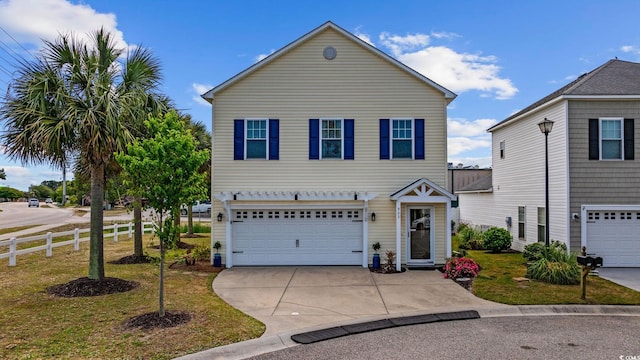903 Ocean Pines Ct, North Myrtle Beach, SC 29582 - traditional home featuring a garage, fence, and driveway