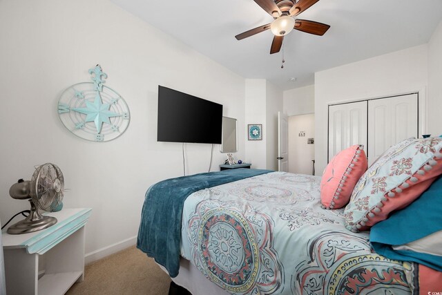 903 Ocean Pines Ct, North Myrtle Beach, SC 29582 - bedroom featuring carpet flooring, a closet, baseboards, and a ceiling fan