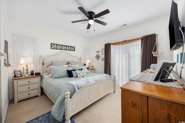 903 Ocean Pines Ct, North Myrtle Beach, SC 29582 - bedroom featuring light colored carpet and ceiling fan