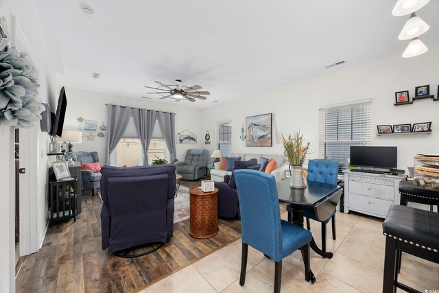 903 Ocean Pines Ct, North Myrtle Beach, SC 29582 - dining space featuring plenty of natural light, a ceiling fan, and light wood-type flooring