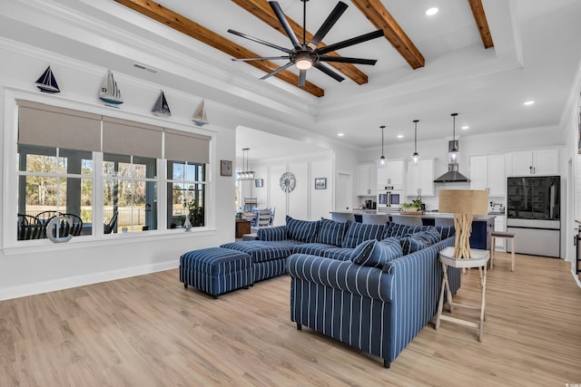 living area featuring recessed lighting, light wood-style floors, and ceiling fan