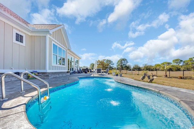 view of pool featuring fence, a patio area, and a fenced in pool