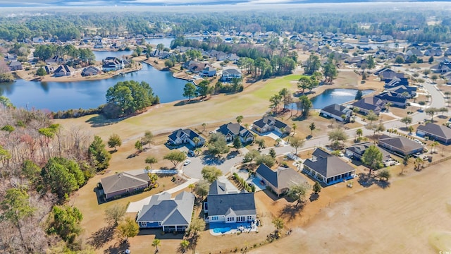 birds eye view of property with a water view, view of golf course, and a residential view