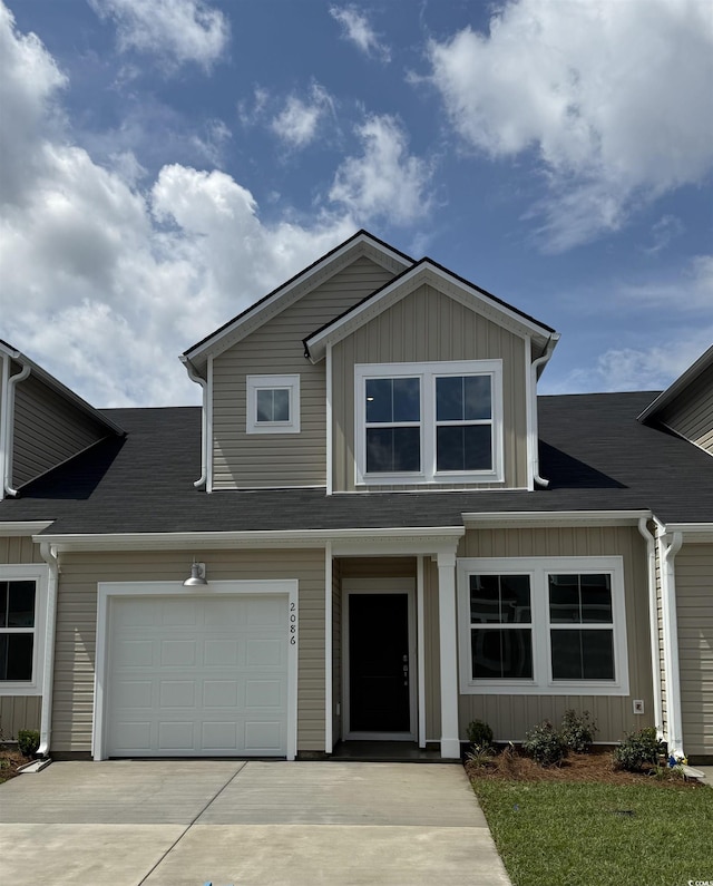 2086 Victory Way Unit 566, Myrtle Beach, SC 29579 - view of front of house featuring concrete driveway and board and batten siding