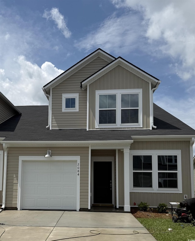 2084 Victory Way Unit 567, Myrtle Beach, SC 29579 - view of front of home featuring concrete driveway, a garage, and board and batten siding