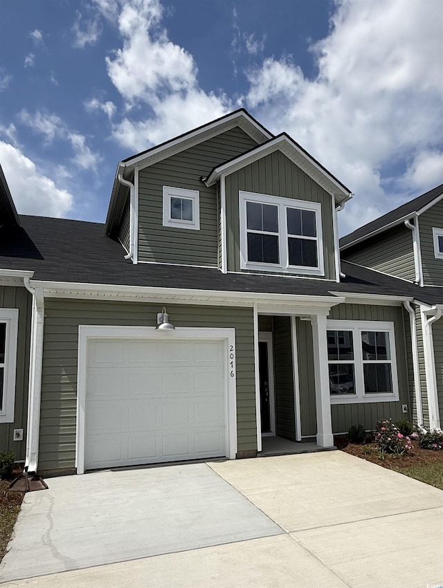 2076 Victory Way Unit 570, Myrtle Beach, SC 29579 - view of front of house featuring concrete driveway and board and batten siding