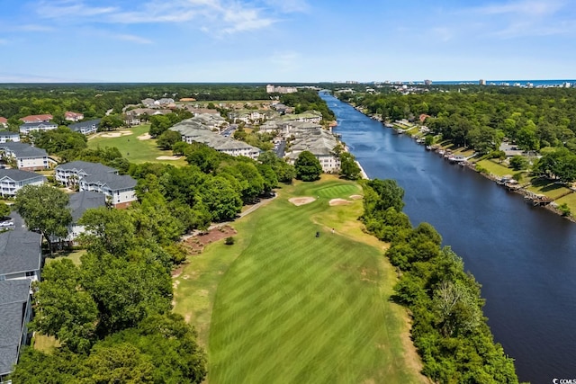birds eye view of property featuring a water view, view of golf course, and a residential view
