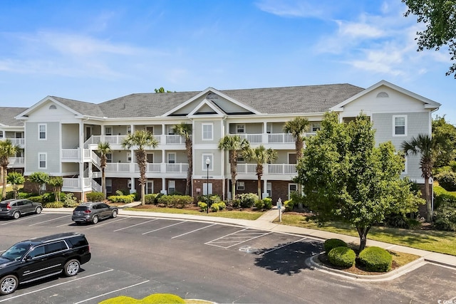 5801 Oyster Catcher Dr Unit 1214, North Myrtle Beach, SC 29582 - view of property featuring uncovered parking