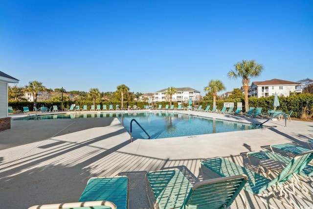 community pool featuring a patio