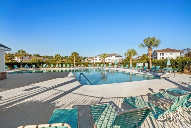 5801 Oyster Catcher Dr Unit 1214, North Myrtle Beach, SC 29582 - community pool featuring a patio