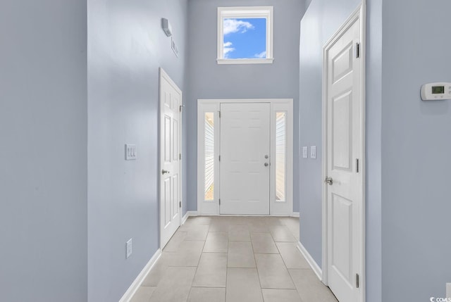 389 Barton Loop, Myrtle Beach, SC 29579 - tiled entryway featuring baseboards, a high ceiling, and healthy amount of natural light
